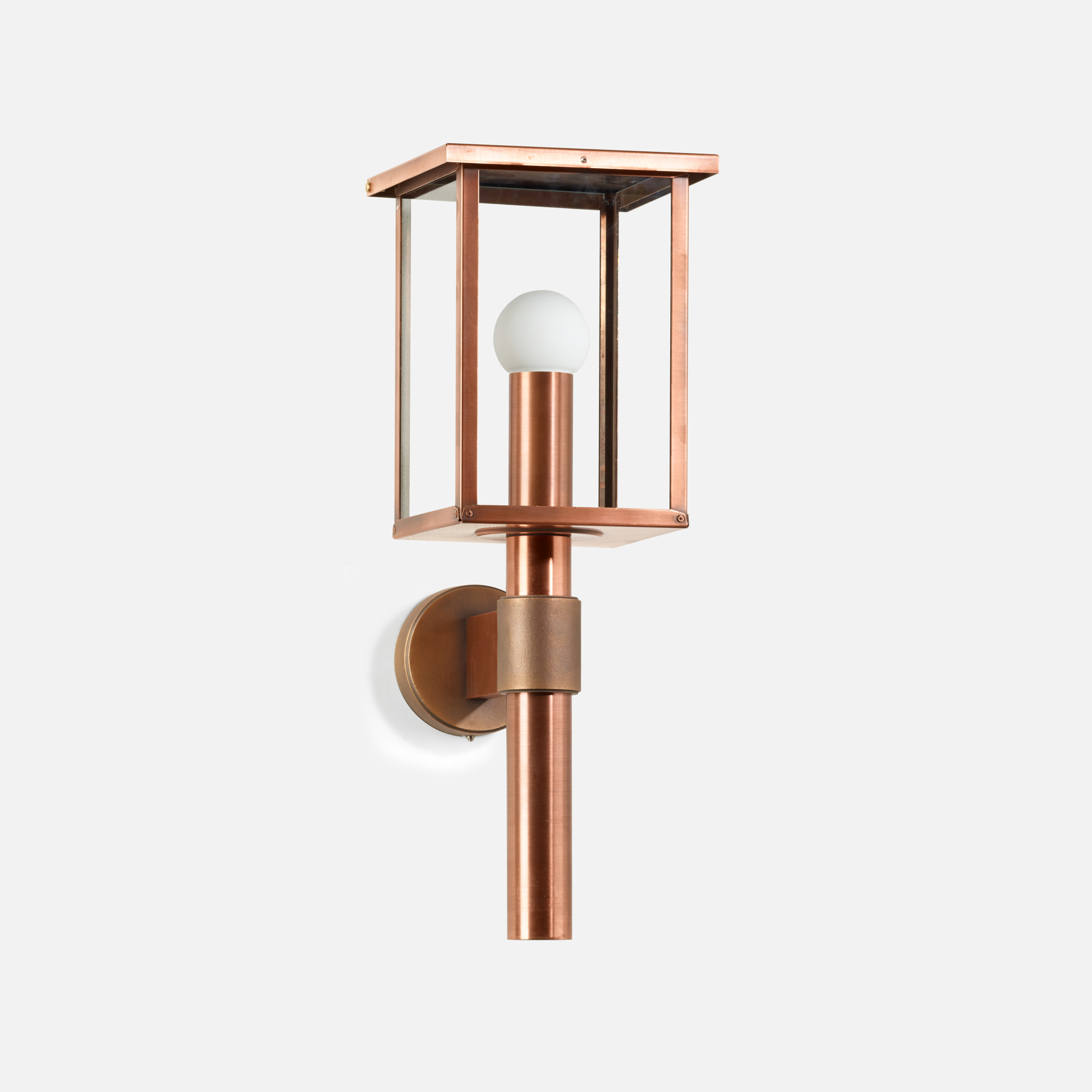 Cast bronze and copper wall luminaire